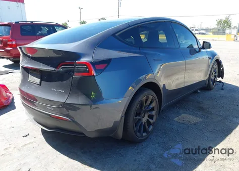 2021 Tesla Model Y Long Range Dual Motor All-Wheel Drive z USA, uszkodzony, nr VIN 5YJYGDEE4MF073681